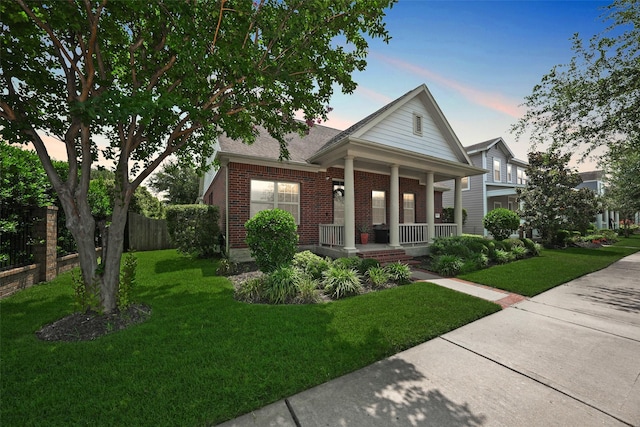 16826 Paynes Creek Dr, Cypress, TX 77433 - view of front of home featuring a porch and brick siding