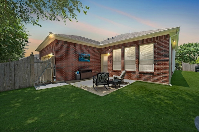 16826 Paynes Creek Dr, Cypress, TX 77433 - back of house with brick siding, a patio, and a gate