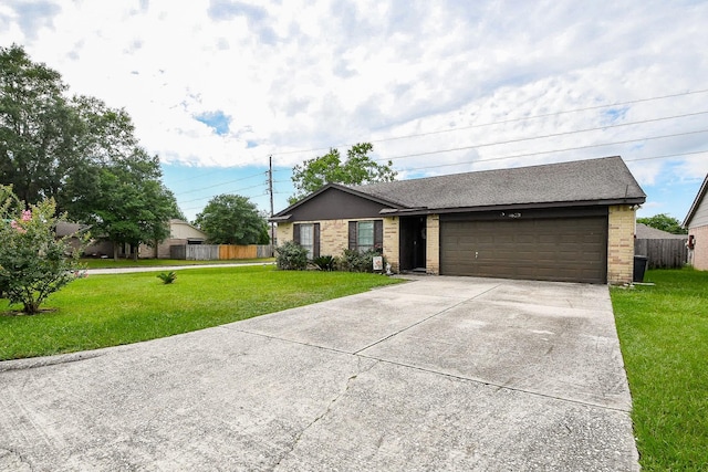 4623 Tealgate Dr, Spring, TX 77373 - single story home with brick siding, concrete driveway, an attached garage, and a shingled roof