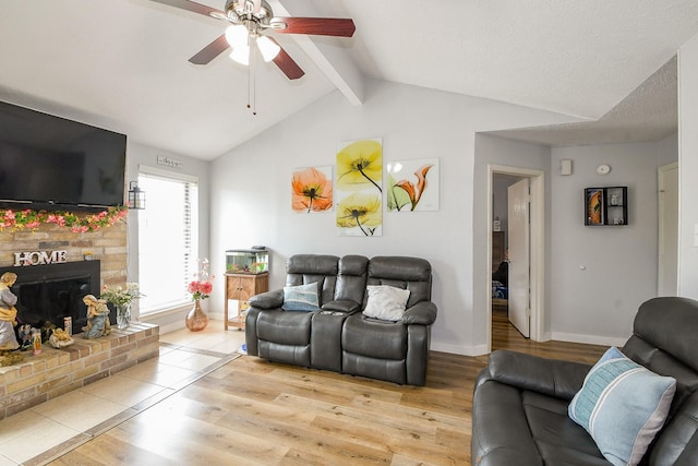 4623 Tealgate Dr, Spring, TX 77373 - living area with a ceiling fan, wood finished floors, a brick fireplace, and baseboards