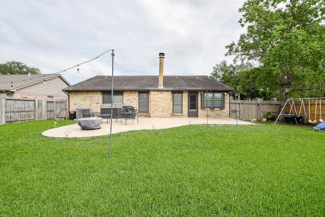 4623 Tealgate Dr, Spring, TX 77373 - rear view of property with a patio, brick siding, and roof with shingles