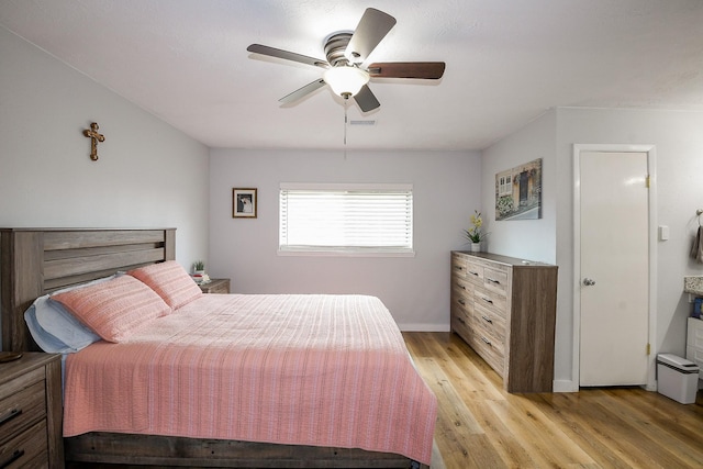 4623 Tealgate Dr, Spring, TX 77373 - bedroom featuring light wood-style floors, ceiling fan, and baseboards