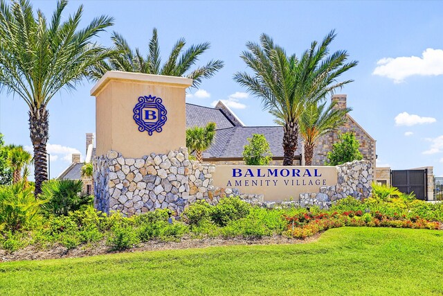 12434 Tullich Run Dr, Humble, TX 77346 - community sign with a lawn