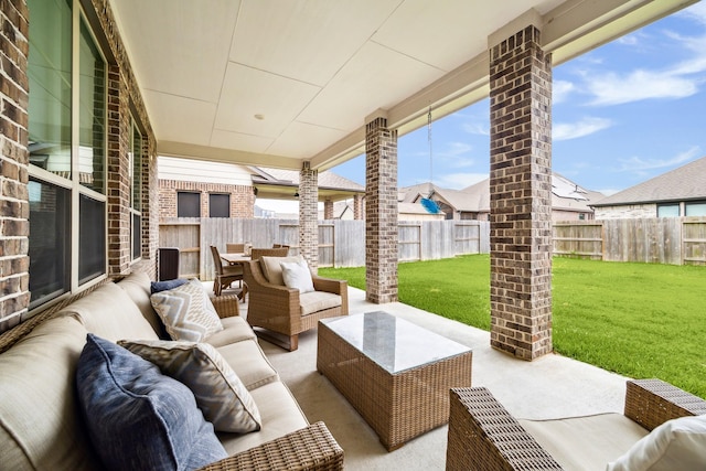 12434 Tullich Run Dr, Humble, TX 77346 - view of patio featuring an outdoor hangout area