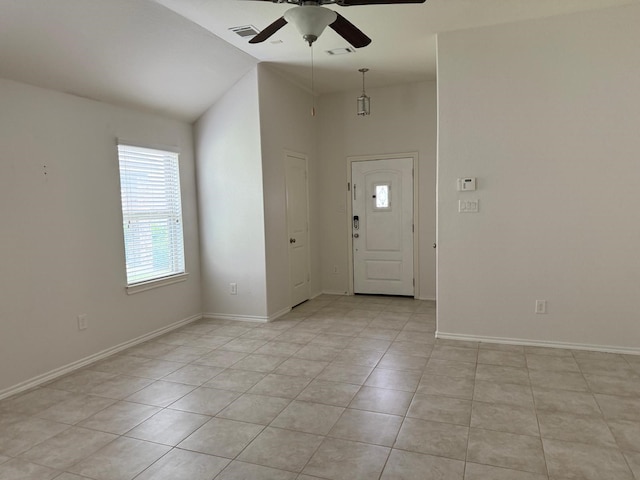 3643 Goldleaf Trail Dr, Katy, TX 77449 - entrance foyer featuring a ceiling fan, light tile patterned flooring, baseboards, and high vaulted ceiling