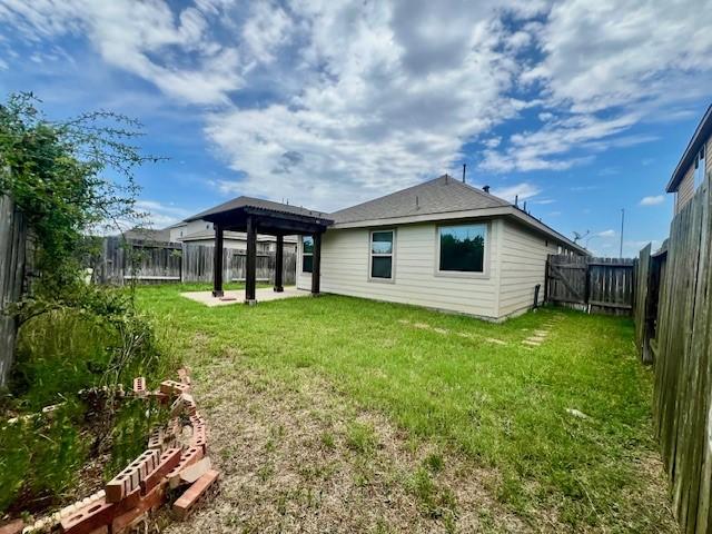 3643 Goldleaf Trail Dr, Katy, TX 77449 - back of house with a patio