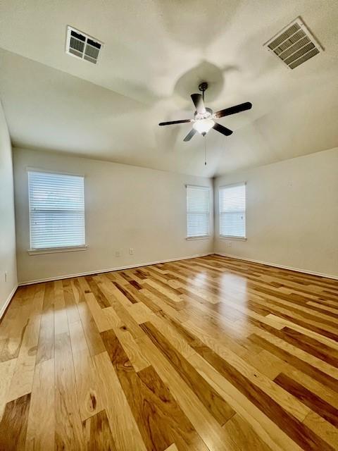 3643 Goldleaf Trail Dr, Katy, TX 77449 - unfurnished room with hardwood / wood-style floors, ceiling fan, and baseboards