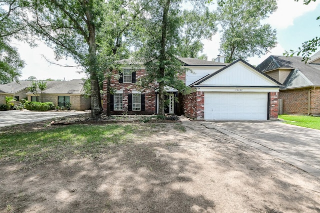 19727 Teller Blvd, Spring, TX 77388 - view of front of house featuring brick siding, an attached garage, and concrete driveway