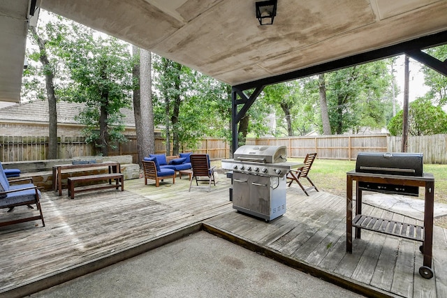 19727 Teller Blvd, Spring, TX 77388 - wooden terrace featuring an outdoor hangout area, grilling area, and a fenced backyard