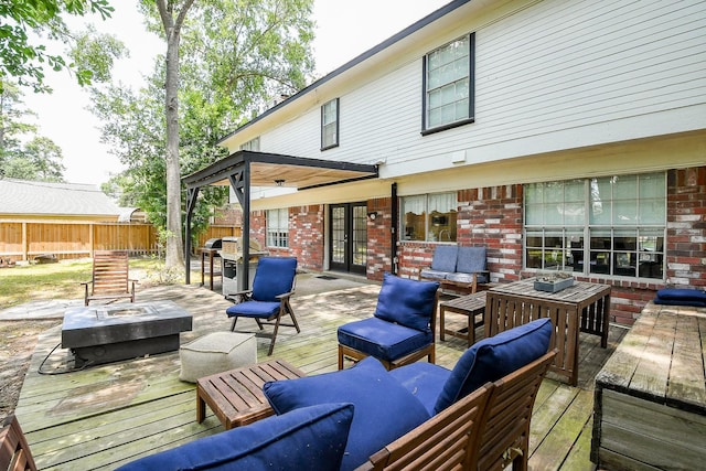19727 Teller Blvd, Spring, TX 77388 - wooden terrace with an outdoor living space with a fire pit and french doors