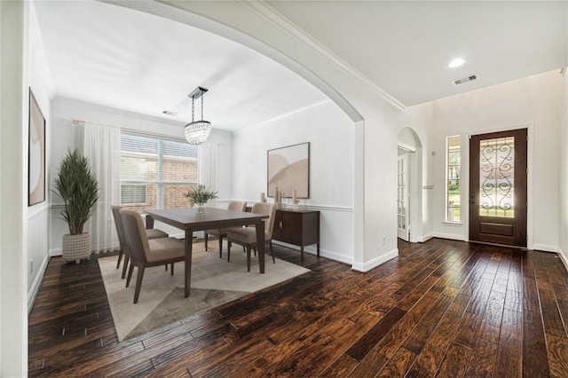 1811 Leela Springs Dr, Conroe, TX 77304 - foyer with hardwood / wood-style floors, arched walkways, and ornamental molding
