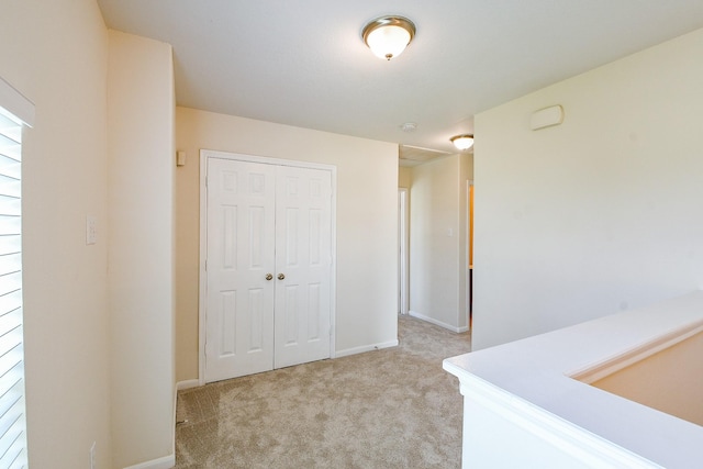 15027 Silhouette Ridge Dr, Humble, TX 77396 - hall with light carpet and baseboards