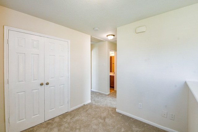 15027 Silhouette Ridge Dr, Humble, TX 77396 - unfurnished bedroom with light colored carpet and a closet