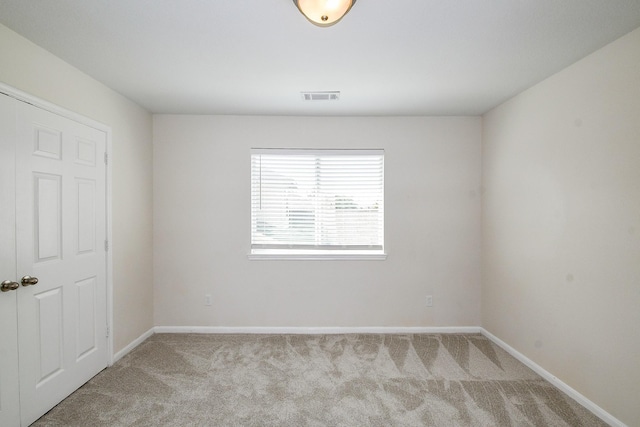 15027 Silhouette Ridge Dr, Humble, TX 77396 - unfurnished room with carpet and baseboards