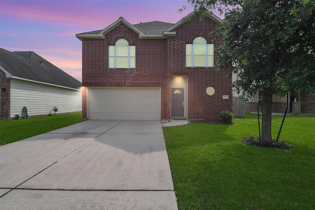15027 Silhouette Ridge Dr, Humble, TX 77396 - traditional-style home featuring driveway, a garage, brick siding, a yard, and a shingled roof