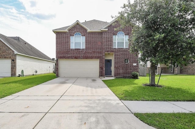 15027 Silhouette Ridge Dr, Humble, TX 77396 - traditional-style home featuring brick siding, an attached garage, concrete driveway, and a front lawn