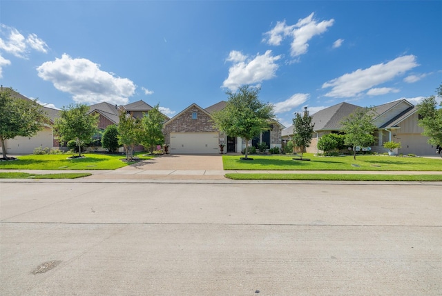 2532 Hailes Ln, College Station, TX 77845 - obstructed view of property featuring driveway, a residential view, a front yard, a garage, and stone siding