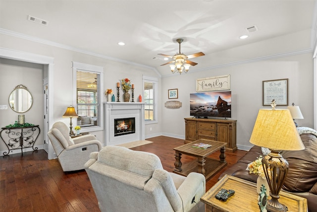 2532 Hailes Ln, College Station, TX 77845 - living room with ceiling fan, crown molding, wood finished floors, a fireplace with flush hearth, and baseboards