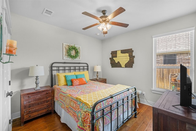 2532 Hailes Ln, College Station, TX 77845 - bedroom featuring wood finished floors, baseboards, and ceiling fan