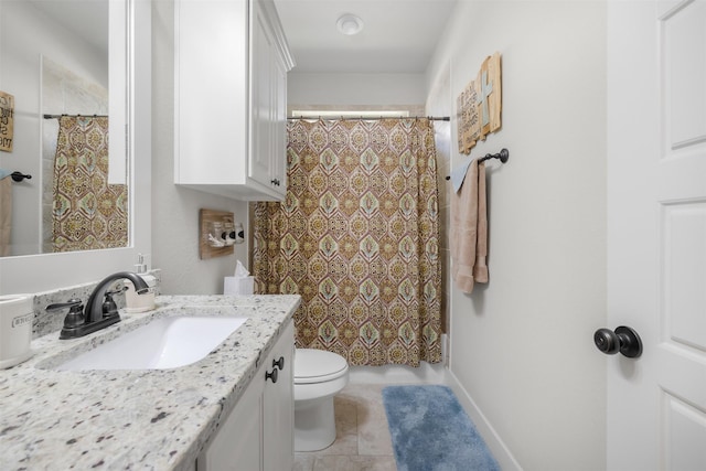 2532 Hailes Ln, College Station, TX 77845 - bathroom with vanity, toilet, and tile patterned floors