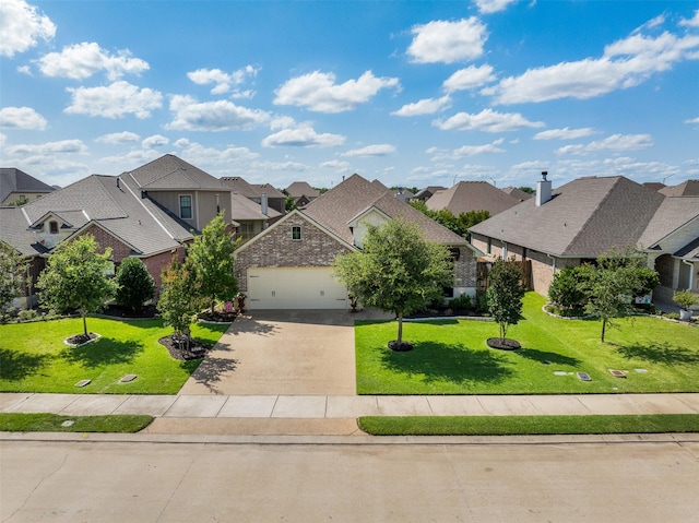2532 Hailes Ln, College Station, TX 77845 - view of front of home with a residential view, concrete driveway, a front lawn, and an attached garage