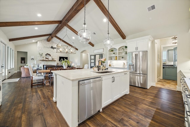21319 Rosehill Church Rd, Tomball, TX 77377 - kitchen with stainless steel appliances, a sink, a center island with sink, open shelves, and white cabinetry