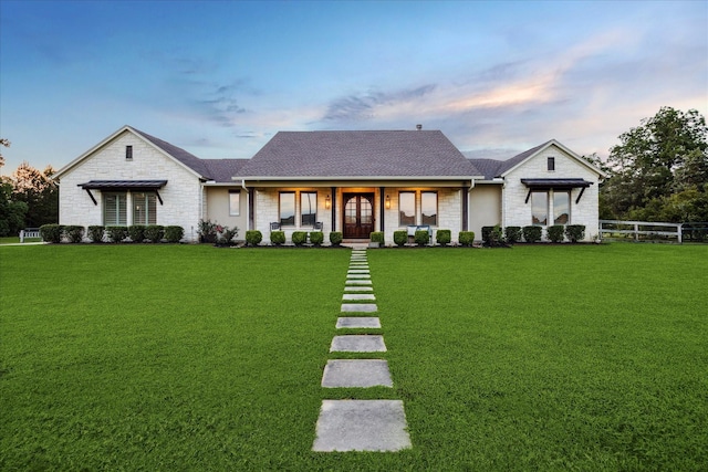 21319 Rosehill Church Rd, Tomball, TX 77377 - modern farmhouse style home with stone siding, a porch, and a shingled roof
