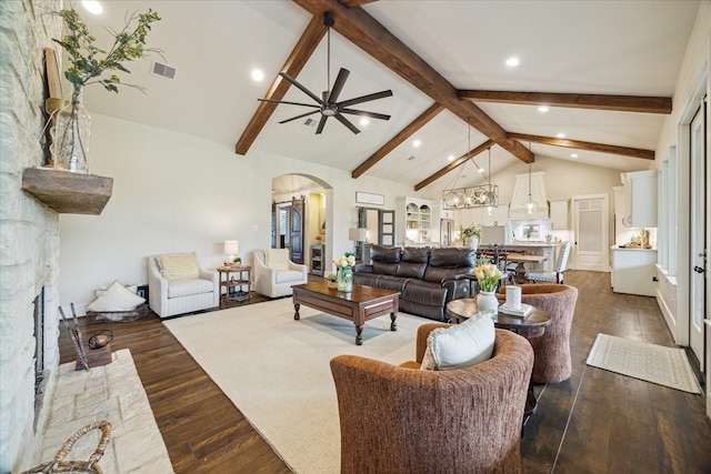 21319 Rosehill Church Rd, Tomball, TX 77377 - living area featuring arched walkways, ceiling fan, dark wood-type flooring, recessed lighting, and a fireplace