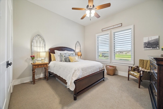 21319 Rosehill Church Rd, Tomball, TX 77377 - bedroom featuring light carpet, baseboards, and ceiling fan