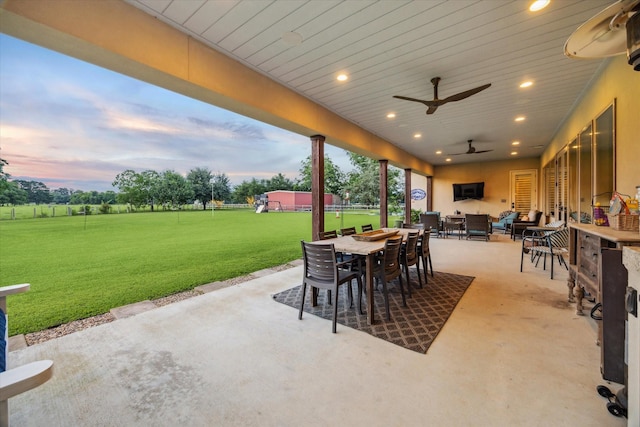 21319 Rosehill Church Rd, Tomball, TX 77377 - patio terrace at dusk featuring a patio area, an outdoor living space, outdoor dining area, and ceiling fan