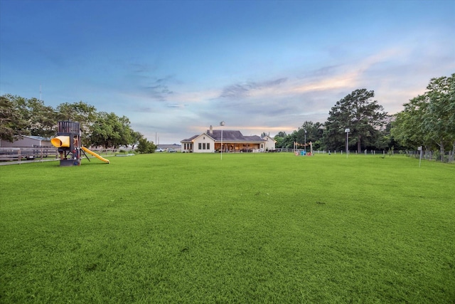 21319 Rosehill Church Rd, Tomball, TX 77377 - yard at dusk with a playground