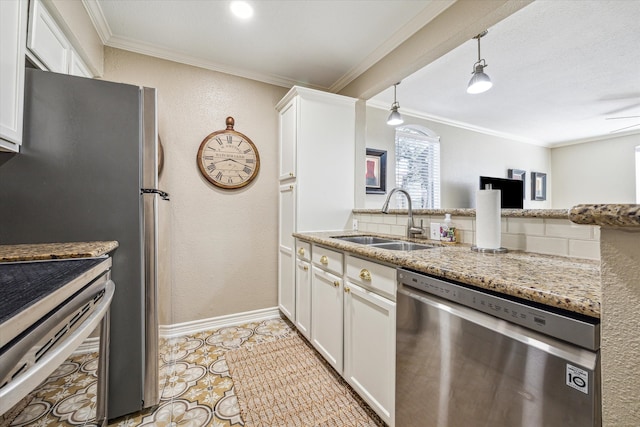 4649 Wild Indigo St Unit 340, Houston, TX 77027 - kitchen with appliances with stainless steel finishes, a sink, crown molding, light stone countertops, and white cabinets