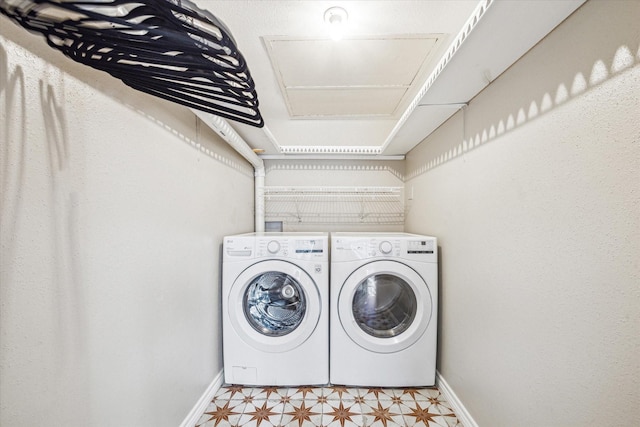 4649 Wild Indigo St Unit 340, Houston, TX 77027 - laundry area with separate washer and dryer, baseboards, and light floors
