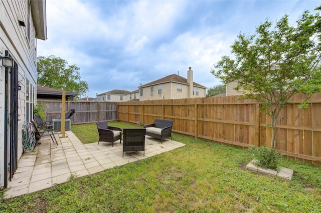 2910 Yearling Colt Ct, Houston, TX 77038 - view of yard featuring a patio area and central air condition unit