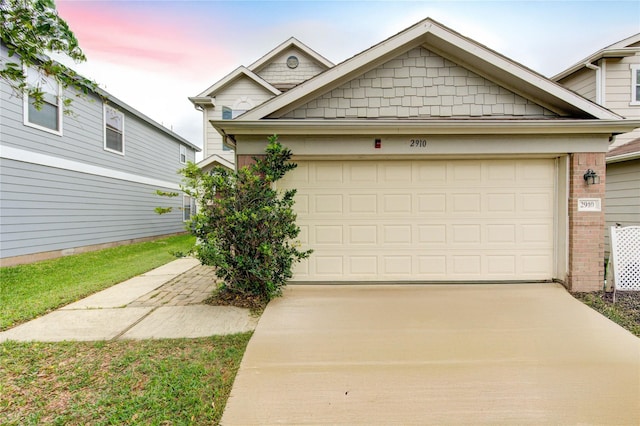 2910 Yearling Colt Ct, Houston, TX 77038 - view of front of house with concrete driveway and an attached garage
