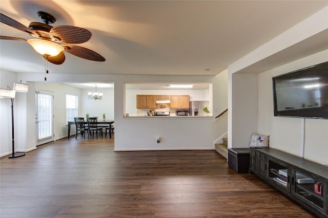2910 Yearling Colt Ct, Houston, TX 77038 - living area with dark wood-style flooring, a chandelier, stairway, and ceiling fan