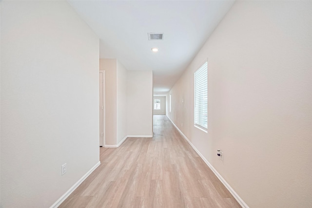 14627 Woodcott Warren Way, Pearland, TX 77545 - hall with light wood-style flooring, baseboards, and recessed lighting