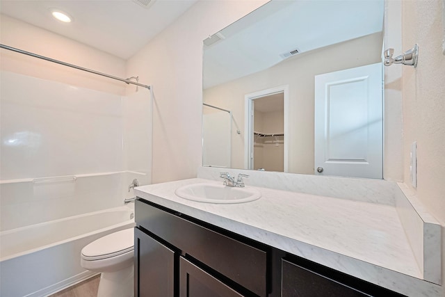 14627 Woodcott Warren Way, Pearland, TX 77545 - bathroom featuring vanity, toilet, tub / shower combination, and recessed lighting