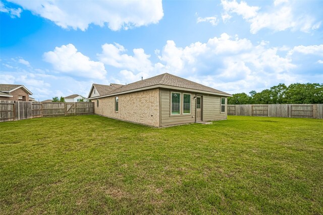14627 Woodcott Warren Way, Pearland, TX 77545 - back of property featuring brick siding