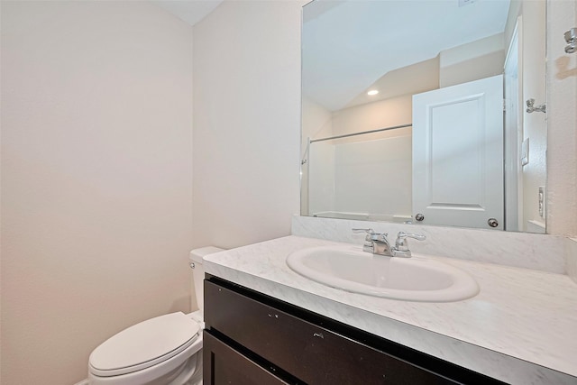 14627 Woodcott Warren Way, Pearland, TX 77545 - bathroom featuring toilet, vanity, a shower, and recessed lighting