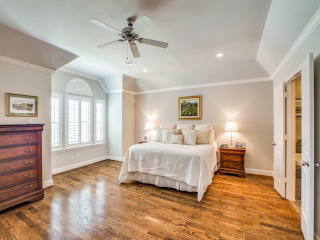 221 W 25th St Unit A, Houston, TX 77008 - bedroom featuring baseboards, wood finished floors, crown molding, vaulted ceiling, and a ceiling fan