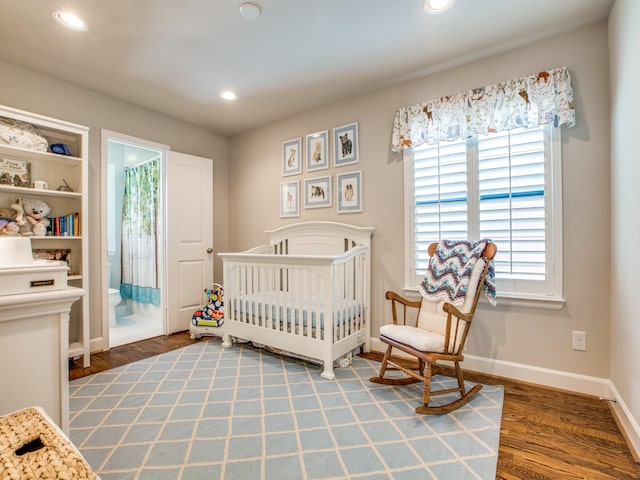 221 W 25th St Unit A, Houston, TX 77008 - bedroom featuring wood finished floors, recessed lighting, and baseboards