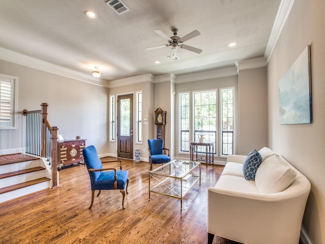 221 W 25th St Unit A, Houston, TX 77008 - living area featuring wood finished floors, recessed lighting, ornamental molding, baseboards, and stairway
