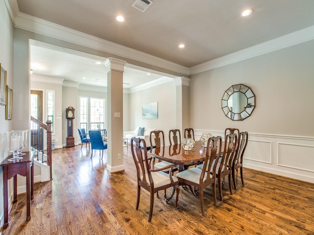 221 W 25th St Unit A, Houston, TX 77008 - dining space featuring ornate columns, wood finished floors, crown molding, recessed lighting, and wainscoting