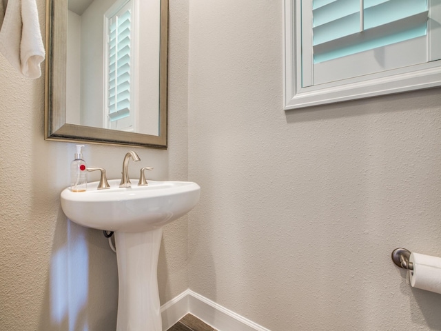 221 W 25th St Unit A, Houston, TX 77008 - bathroom featuring baseboards