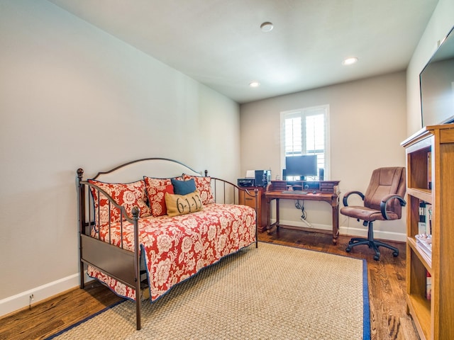 221 W 25th St Unit A, Houston, TX 77008 - bedroom with wood finished floors, recessed lighting, baseboards, and a desk