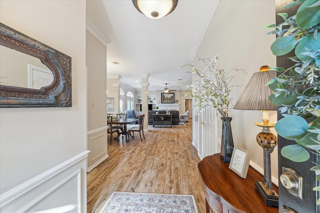 1902 Carriage Brook Way, Houston, TX 77062 - entryway featuring ornate columns, ornamental molding, and light wood-style floors