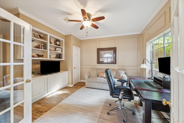 1902 Carriage Brook Way, Houston, TX 77062 - office space with a decorative wall, a ceiling fan, ornamental molding, and light wood-style flooring