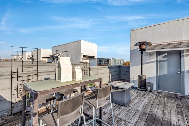 1604 Bastrop St, Houston, TX 77003 - wooden deck with an outdoor fire pit