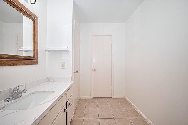 4304 Sherwood Ln Unit 106, Houston, TX 77092 - bathroom featuring vanity, tile patterned flooring, and baseboards